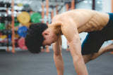 an muscular athlete doing S&C training in sportential training studio and clinic