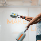 two athletes doing kettle bell swing exercise in sportential training studio and clinc