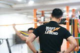 a patient is doing overhead squat with stick for rehabilitation in sportential training studio and clinic